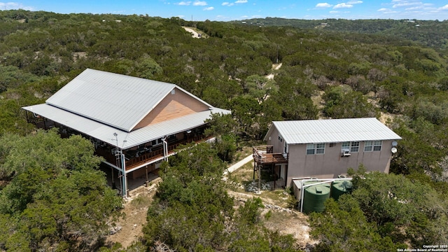 388 Oak, Pipe Creek, TX 78063 - aerial view of property and surrounding area with a forest