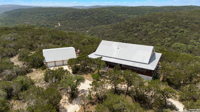 388 Oak, Pipe Creek, TX 78063 - view from above of property featuring a heavily wooded area and mountains