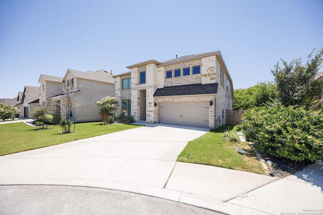 807 Swenson Rnch, San Antonio, TX 78245 - view of front of property with a garage, concrete driveway, a front lawn, and stone siding
