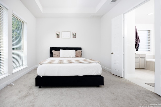 807 Swenson Rnch, San Antonio, TX 78245 - carpeted bedroom with a raised ceiling and baseboards