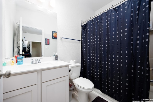 807 Swenson Rnch, San Antonio, TX 78245 - bathroom with toilet, vanity, and a shower with curtain