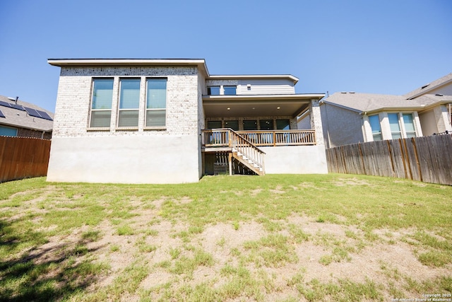 807 Swenson Rnch, San Antonio, TX 78245 - rear view of house with stairs, brick siding, and a wooden deck