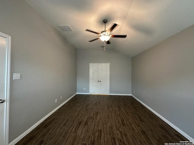 1116 Eagle, Seguin, TX 78155 - spare room featuring ceiling fan, dark wood-style flooring, baseboards, and lofted ceiling