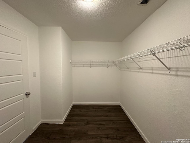 1116 Eagle, Seguin, TX 78155 - spacious closet featuring dark wood-style floors