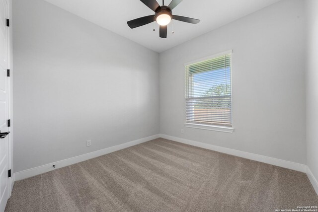 191 Azalea Aly, Castroville, TX 78009 - carpeted spare room with baseboards and ceiling fan