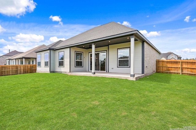 191 Azalea Aly, Castroville, TX 78009 - back of house with a patio area