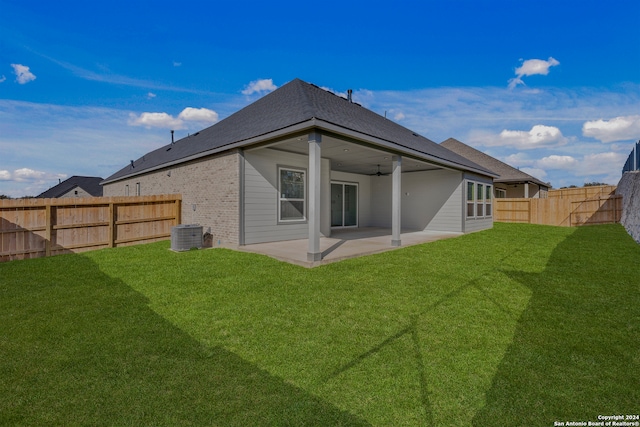 243 Wisteria Vw, Castroville, TX 78009 - rear view of house featuring a patio area, brick siding, ceiling fan, a shingled roof, and central AC