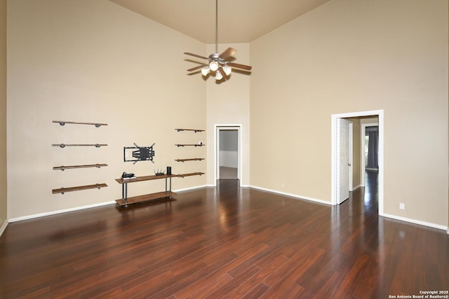 27218 Spiral Cyn, San Antonio, TX 78261 - empty room featuring high vaulted ceiling, wood finished floors, baseboards, and ceiling fan
