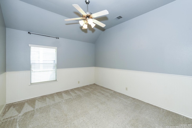 27218 Spiral Cyn, San Antonio, TX 78261 - carpeted spare room with vaulted ceiling and ceiling fan