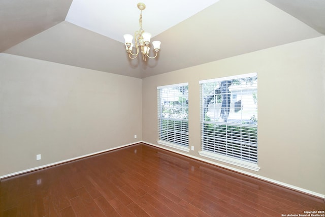 27218 Spiral Cyn, San Antonio, TX 78261 - unfurnished room featuring wood finished floors, baseboards, a chandelier, and vaulted ceiling