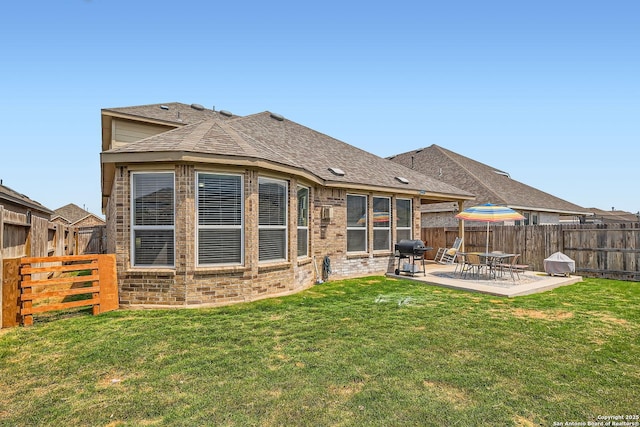 2215 Zachry, New Braunfels, TX 78132 - back of house with a patio, brick siding, and a shingled roof