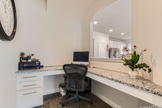 2215 Zachry, New Braunfels, TX 78132 - office with built in study area, dark wood finished floors, arched walkways, and recessed lighting