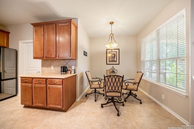 12518 Cascade Hls, San Antonio, TX 78253 - dining area featuring light tile patterned flooring and baseboards