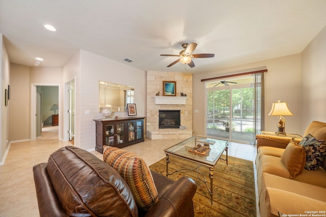 12518 Cascade Hls, San Antonio, TX 78253 - living area with ceiling fan, light tile patterned floors, a fireplace, recessed lighting, and baseboards