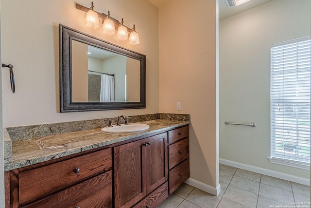 1459 Janets, New Braunfels, TX 78130 - bathroom with vanity, tile patterned floors, and baseboards
