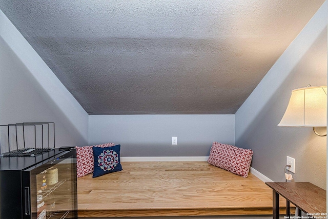 1459 Janets, New Braunfels, TX 78130 - detailed view of wood finished floors, baseboards, and a textured ceiling
