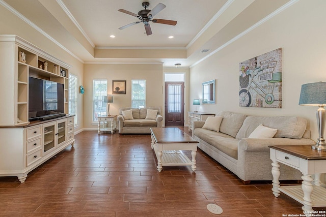 1459 Janets, New Braunfels, TX 78130 - living room featuring ceiling fan, a tray ceiling, crown molding, dark wood finished floors, and baseboards