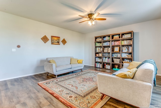 7010 Whipsaw Pt, San Antonio, TX 78253 - living area with a ceiling fan, wood finished floors, and baseboards