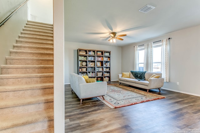 7010 Whipsaw Pt, San Antonio, TX 78253 - living room with stairs, a ceiling fan, wood finished floors, and baseboards