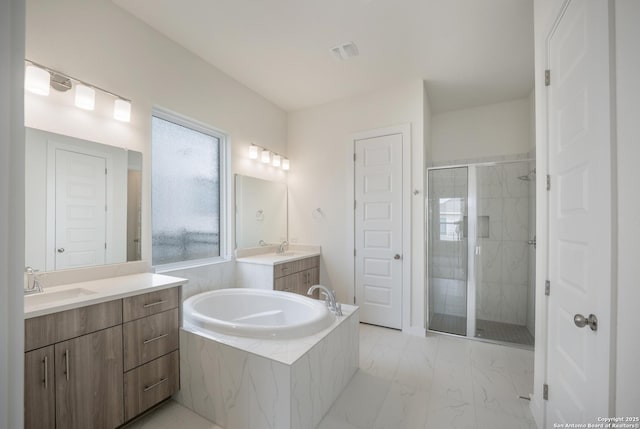 103 Valencia, Boerne, TX 78006 - full bathroom with a shower stall, a bath, marble finish flooring, and two vanities