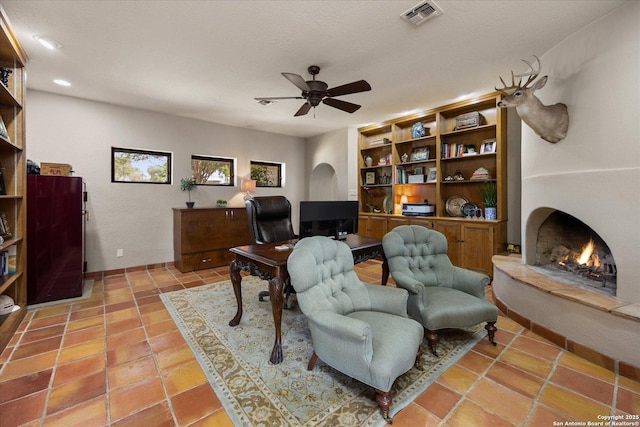 8122 Triple Crown, Fair Oaks Ranch, TX 78015 - office area featuring a ceiling fan, light tile patterned floors, a lit fireplace, and recessed lighting