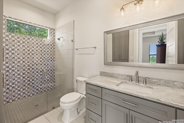 8122 Triple Crown, Fair Oaks Ranch, TX 78015 - full bathroom with a tile shower, toilet, tile patterned floors, and vanity