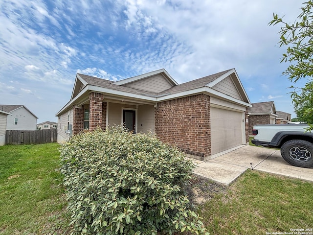 2340 Arctic Warbler, New Braunfels, TX 78130 - view of property exterior featuring brick siding, driveway, and a garage
