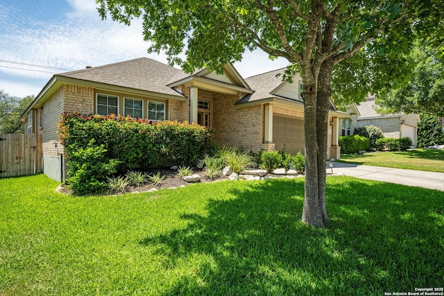 24931 Crescent Run, San Antonio, TX 78258 - view of front of property with an attached garage, brick siding, and roof with shingles