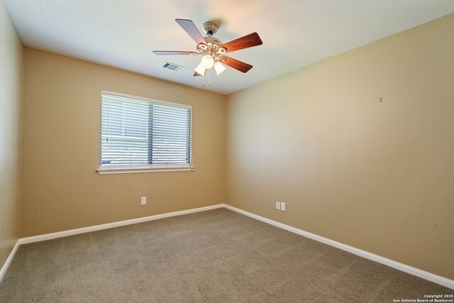 24931 Crescent Run, San Antonio, TX 78258 - unfurnished room with baseboards, carpet floors, and a ceiling fan