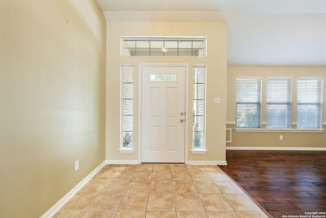 24931 Crescent Run, San Antonio, TX 78258 - entrance foyer with healthy amount of natural light, tile patterned flooring, and baseboards