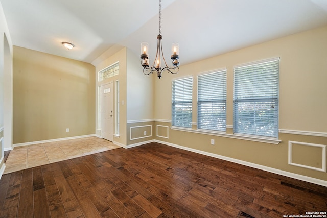 24931 Crescent Run, San Antonio, TX 78258 - spare room with hardwood / wood-style flooring and a chandelier