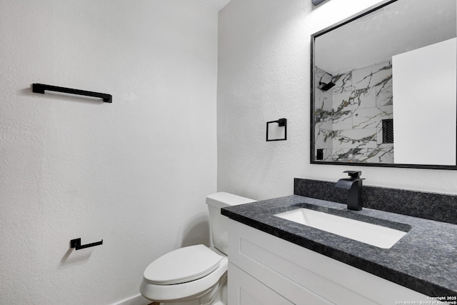 246 Bamburgh Dr, San Antonio, TX 78216 - full bathroom featuring toilet, a textured wall, a shower, and vanity