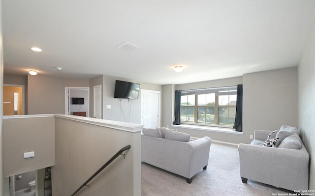5727 Ivans Farm, San Antonio, TX 78244 - living room with light colored carpet, baseboards, and recessed lighting