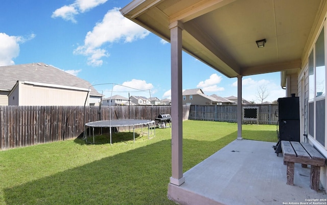 5727 Ivans Farm, San Antonio, TX 78244 - view of yard with a patio, a residential view, and a trampoline