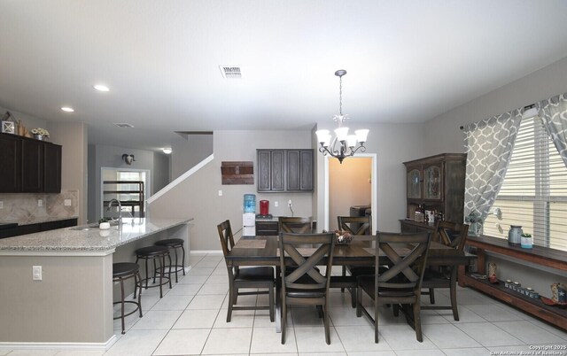 5727 Ivans Farm, San Antonio, TX 78244 - dining area featuring a chandelier, light tile patterned floors, and recessed lighting