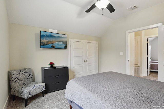 621 Center St, San Antonio, TX 78202 - bedroom featuring light colored carpet, lofted ceiling, a closet, and a ceiling fan