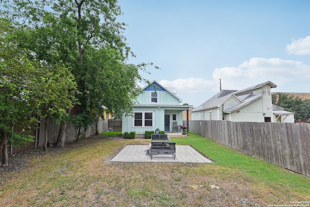 621 Center St, San Antonio, TX 78202 - back of house featuring a patio and board and batten siding