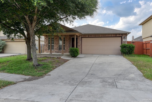 114 Arcadia Pl, Cibolo, TX 78108 - single story home featuring an attached garage, concrete driveway, brick siding, covered porch, and roof with shingles