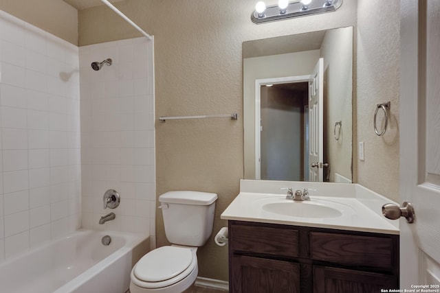 114 Arcadia Pl, Cibolo, TX 78108 - bathroom with toilet, vanity, shower / washtub combination, and a textured wall