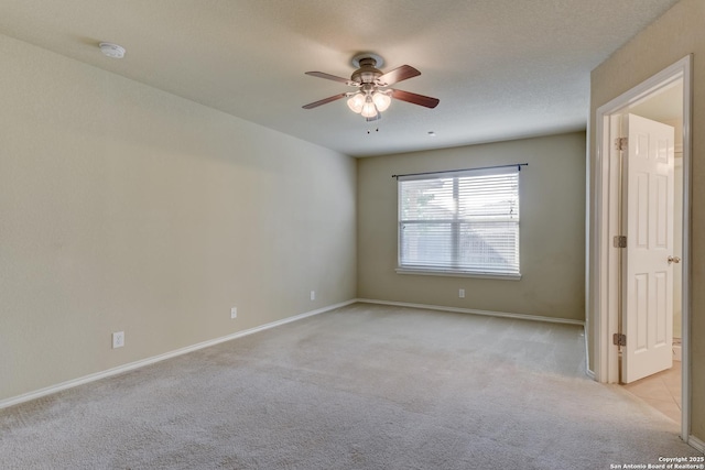 114 Arcadia Pl, Cibolo, TX 78108 - empty room featuring light colored carpet, a ceiling fan, and baseboards