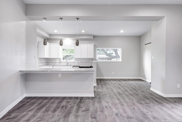 123 Riviera, Castle Hills, TX 78213 - kitchen with white cabinetry, wood finished floors, baseboards, and recessed lighting