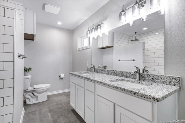 123 Riviera, Castle Hills, TX 78213 - bathroom with toilet, baseboards, double vanity, and tiled shower