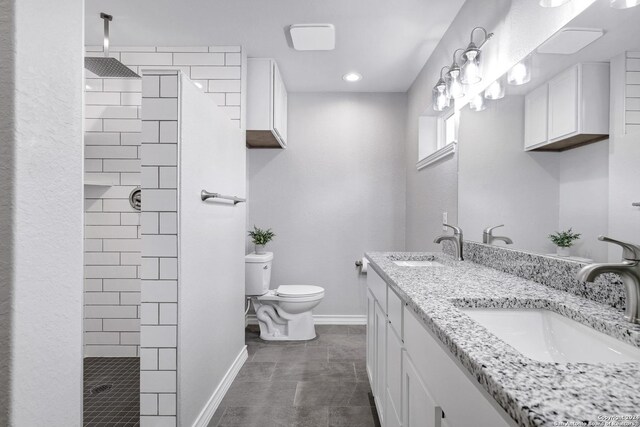 123 Riviera, Castle Hills, TX 78213 - bathroom with toilet, tiled shower, baseboards, double vanity, and recessed lighting