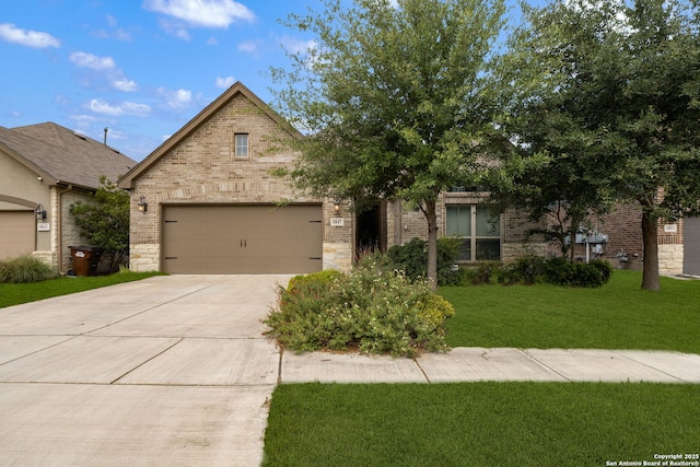 5847 Sweetwater, San Antonio, TX 78253 - view of front of house with driveway, brick siding, a garage, and a front lawn