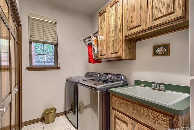 13742 Corinth, Universal City, TX 78148 - washroom with cabinet space, independent washer and dryer, light tile patterned floors, and baseboards