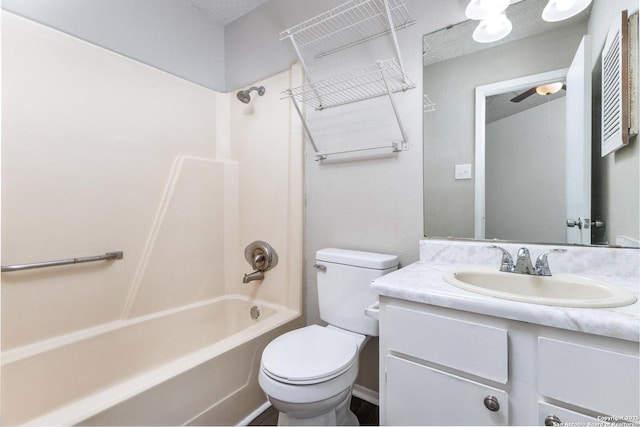 546 Dukeway, Universal City, TX 78148 - bathroom featuring toilet, vanity, shower / bathtub combination, and a ceiling fan
