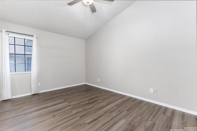 546 Dukeway, Universal City, TX 78148 - empty room with wood finished floors, a ceiling fan, lofted ceiling, and baseboards