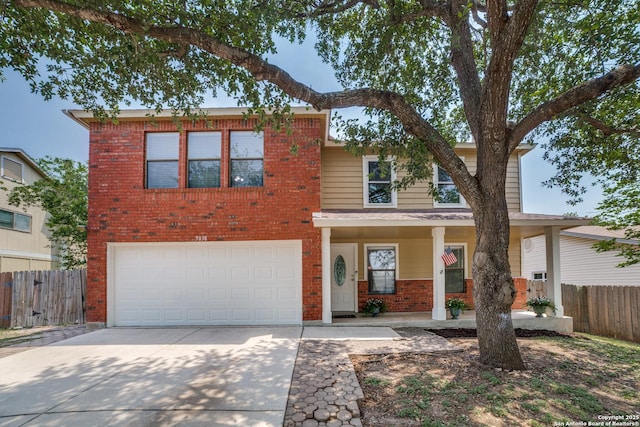 9838 Trendwood, San Antonio, TX 78250 - traditional-style home featuring brick siding, fence, concrete driveway, an attached garage, and covered porch