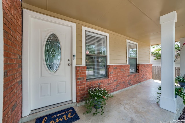 9838 Trendwood, San Antonio, TX 78250 - entrance to property featuring brick siding and covered porch