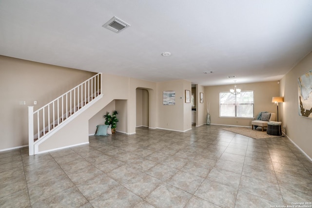 9838 Trendwood, San Antonio, TX 78250 - unfurnished living room featuring stairs, a chandelier, arched walkways, and baseboards